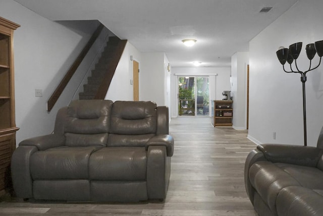 living room with hardwood / wood-style floors