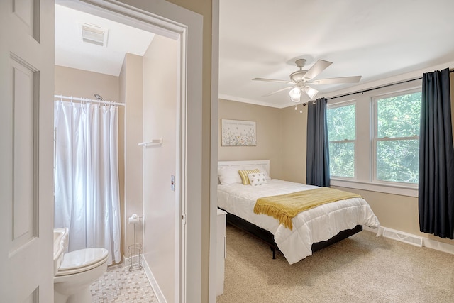 bedroom with ceiling fan and light colored carpet