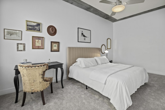 bedroom with carpet, ceiling fan, and baseboards