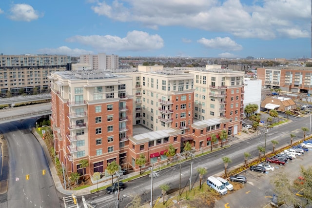 birds eye view of property with a view of city