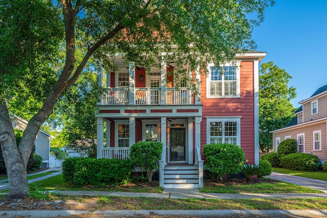 view of front facade featuring a porch and a balcony