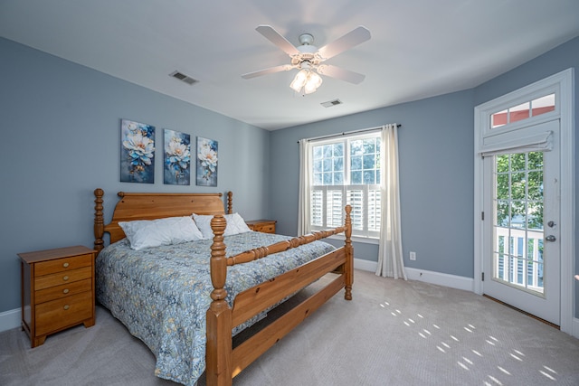bedroom with visible vents, baseboards, access to outside, and light carpet
