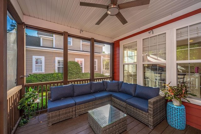 sunroom with ceiling fan and an outdoor hangout area