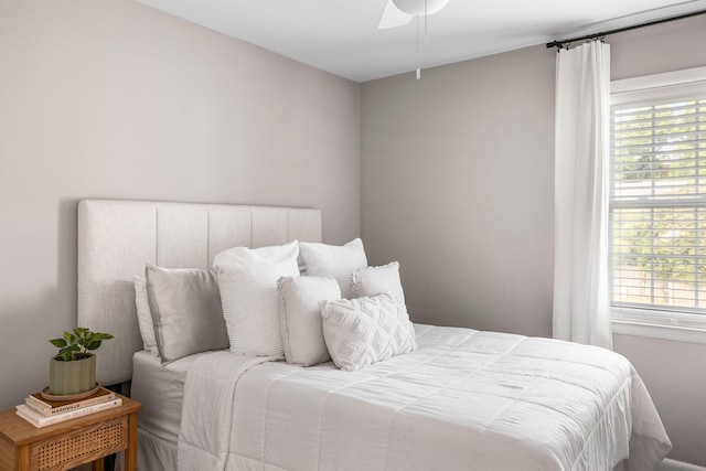 bedroom featuring ceiling fan