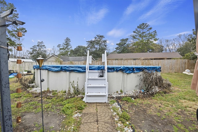 view of patio with a covered pool