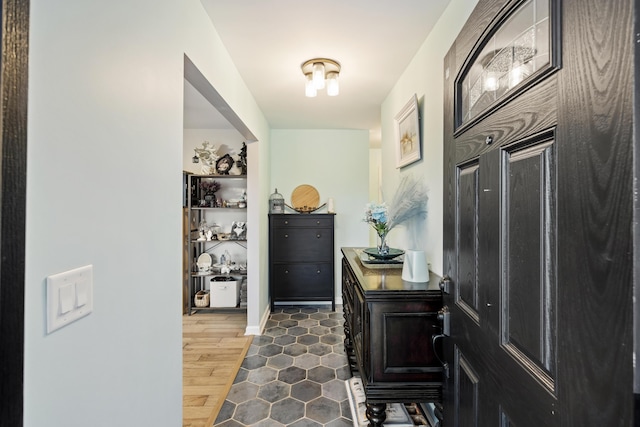 interior space with dark hardwood / wood-style flooring