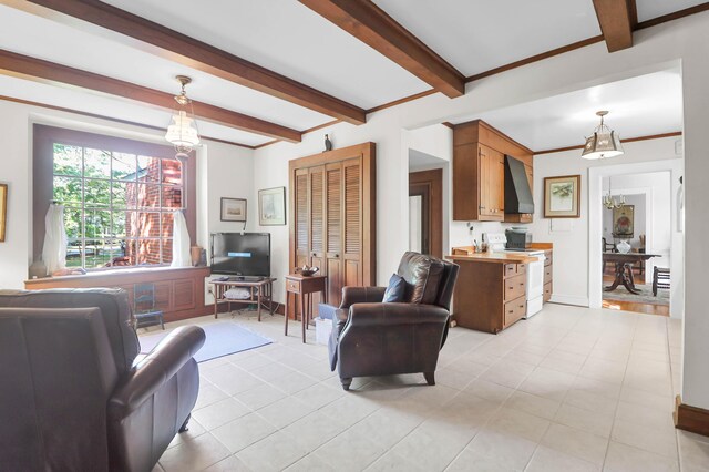 living area featuring beam ceiling and an inviting chandelier