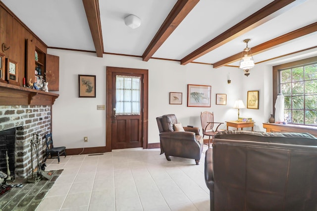 living room with light tile patterned flooring, a brick fireplace, beam ceiling, and baseboards