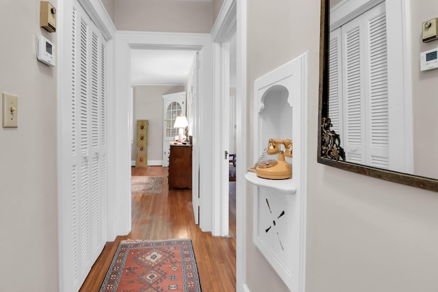 corridor with light wood-style floors