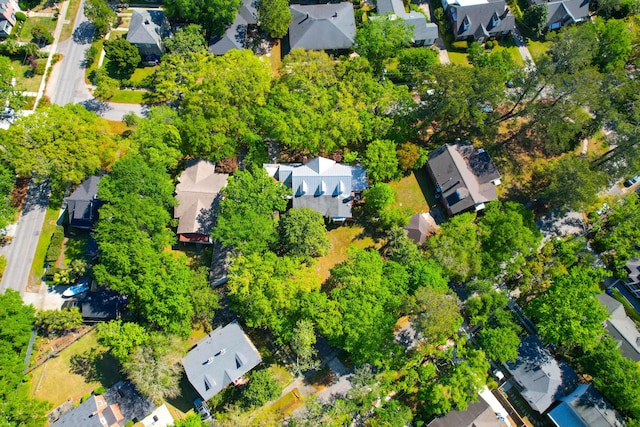 birds eye view of property with a residential view