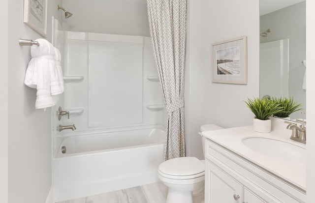 full bath featuring shower / tub combo with curtain, toilet, and vanity