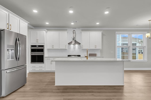 kitchen featuring appliances with stainless steel finishes, white cabinets, crown molding, and tasteful backsplash