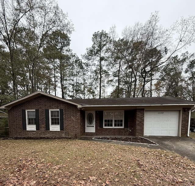 single story home with a garage