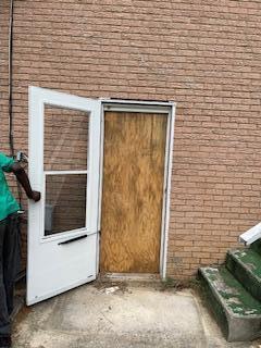 495 Majority Rd, Orangeburg, SC 29118 - property entrance featuring brick siding
