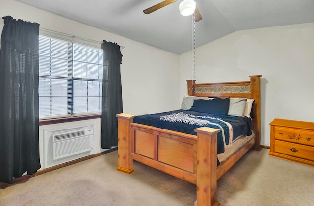 bedroom featuring carpet flooring, ceiling fan, lofted ceiling, and a wall unit AC