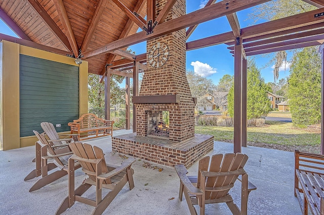 view of patio / terrace with an outdoor brick fireplace