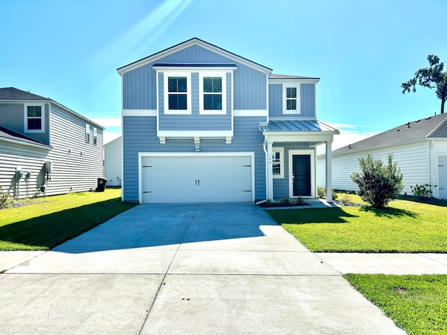 view of front of home featuring a front lawn and a garage