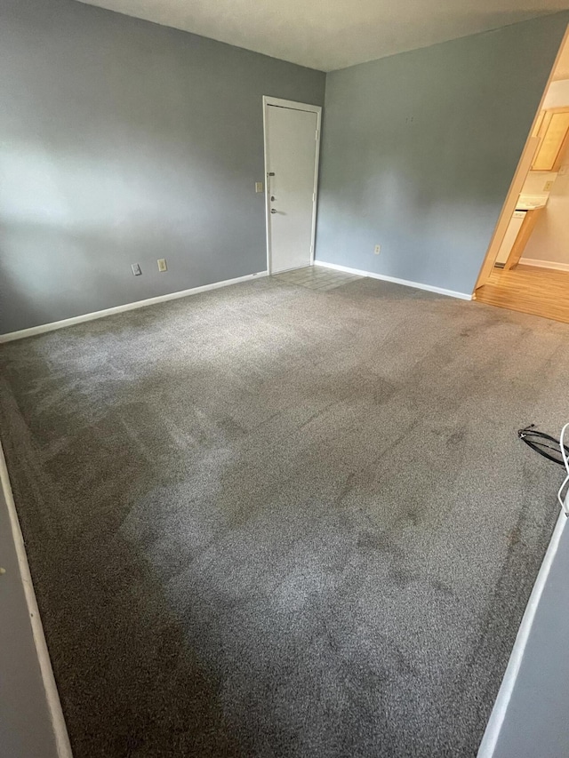 21 Rivers Point Row Unit 17B, Charleston, SC 29412 - carpeted spare room featuring baseboards