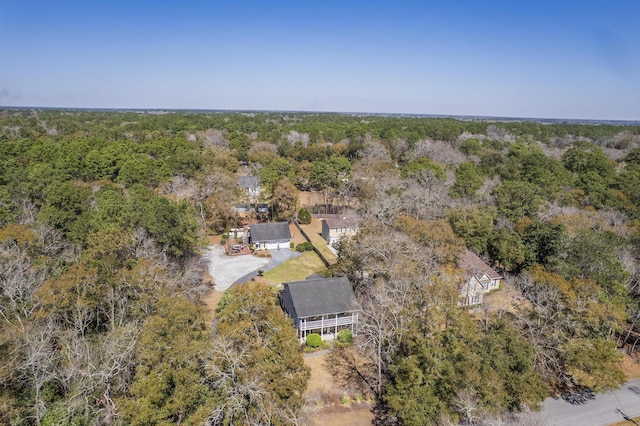 aerial view with a wooded view