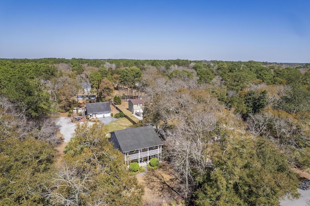 bird's eye view featuring a forest view