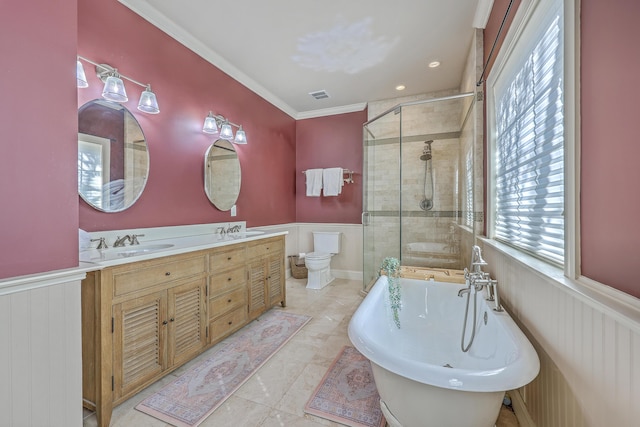 bathroom featuring a soaking tub, a wainscoted wall, and a shower stall