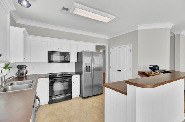 kitchen featuring white cabinets, crown molding, sink, and black appliances