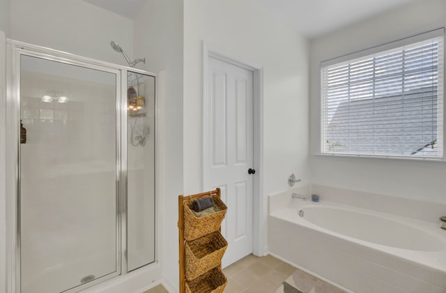 bathroom featuring plus walk in shower