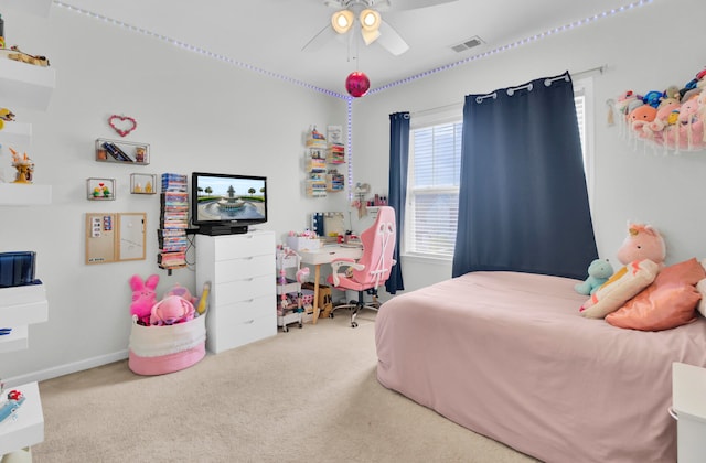 carpeted bedroom featuring ceiling fan