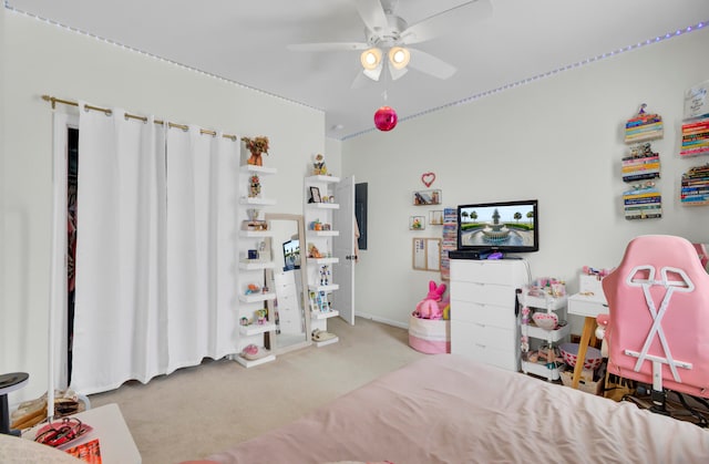 bedroom with ceiling fan and light carpet