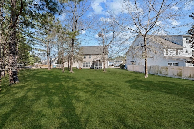 view of yard featuring fence