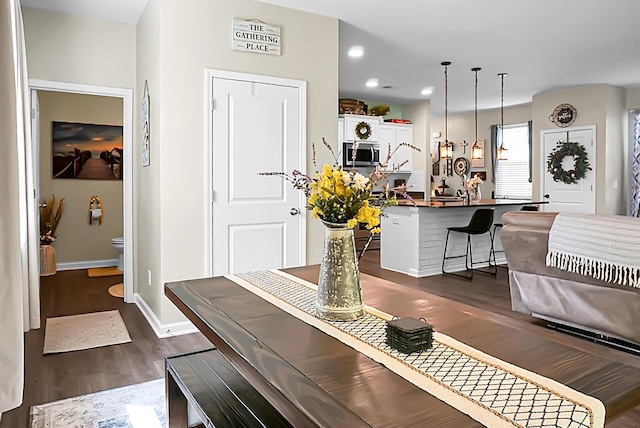 508 Glady Rd, Moncks Corner, SC 29461 - dining room with dark wood-type flooring, baseboards, and recessed lighting