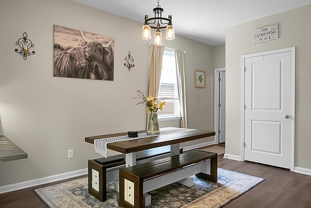 508 Glady Rd, Moncks Corner, SC 29461 - dining room with dark wood-style flooring, a chandelier, and baseboards