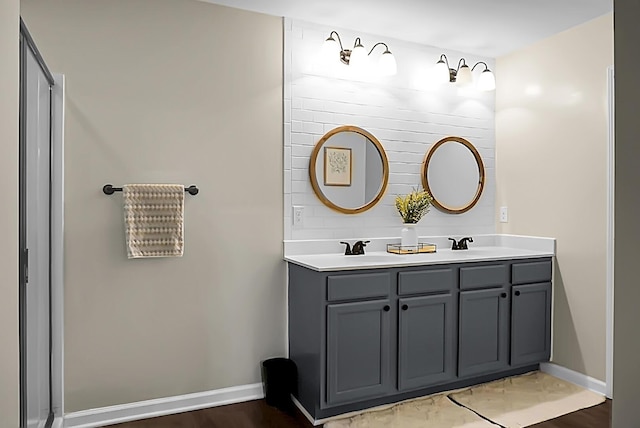 508 Glady Rd, Moncks Corner, SC 29461 - bathroom with double vanity, baseboards, and tasteful backsplash