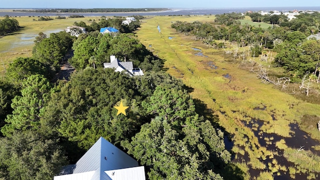 birds eye view of property with a rural view