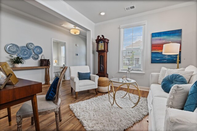 403 Cool Bend Ln, Summerville, SC 29486 - living area featuring ornamental molding, healthy amount of natural light, wood finished floors, baseboards, and recessed lighting