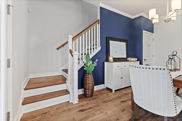 403 Cool Bend Ln, Summerville, SC 29486 - stairway with wood finished floors, a chandelier, crown molding, and baseboards