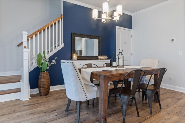 403 Cool Bend Ln, Summerville, SC 29486 - dining space featuring a chandelier, stairs, wood finished floors, baseboards, and crown molding