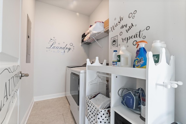 403 Cool Bend Ln, Summerville, SC 29486 - clothes washing area with washer and clothes dryer, light tile patterned flooring, baseboards, and electric panel