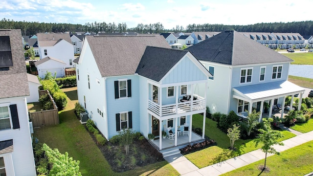 403 Cool Bend Ln, Summerville, SC 29486 - rear view of property with a balcony, a lawn, board and batten siding, a residential view, and central AC unit