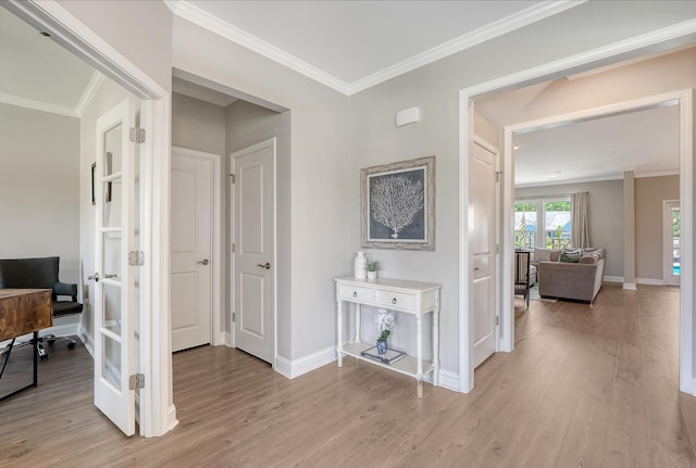 3173 Hugh Bennett Dr, Johns Island, SC 29455 - hall with light wood-style floors, baseboards, and crown molding