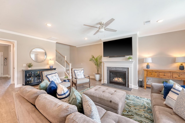 3173 Hugh Bennett Dr, Johns Island, SC 29455 - living room featuring ceiling fan, baseboards, recessed lighting, ornamental molding, and a fireplace with flush hearth