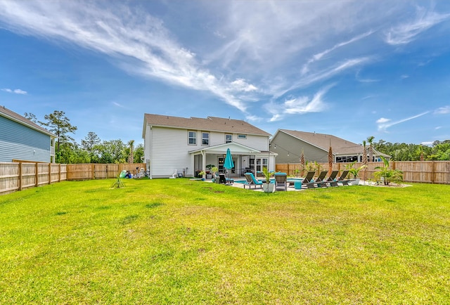 3173 Hugh Bennett Dr, Johns Island, SC 29455 - rear view of house with a patio area