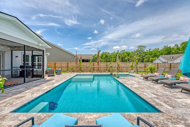 3173 Hugh Bennett Dr, Johns Island, SC 29455 - view of pool with a patio, a sunroom, and a fenced backyard