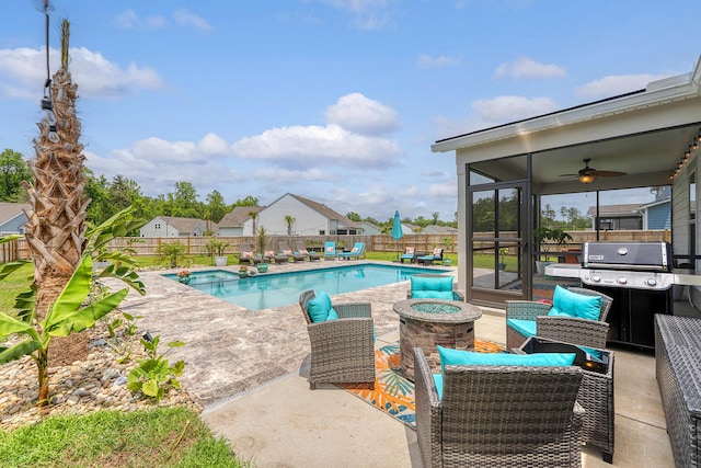 3173 Hugh Bennett Dr, Johns Island, SC 29455 - view of swimming pool with a fire pit, a fenced backyard, a patio area, ceiling fan, and area for grilling