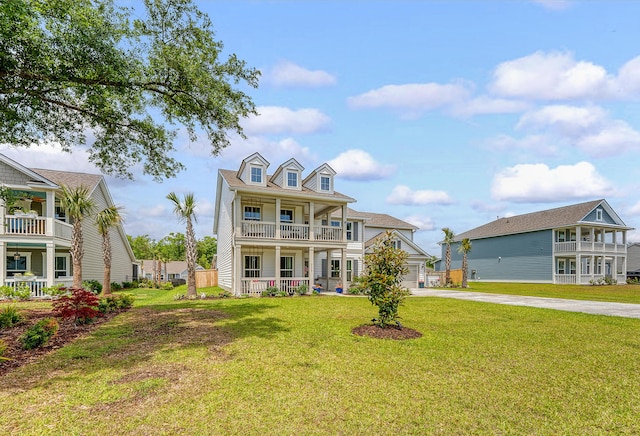 3173 Hugh Bennett Dr, Johns Island, SC 29455 - view of front facade with a porch, driveway, and a front yard