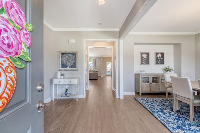 3173 Hugh Bennett Dr, Johns Island, SC 29455 - entryway featuring wood finished floors, baseboards, and crown molding
