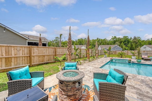 3173 Hugh Bennett Dr, Johns Island, SC 29455 - view of swimming pool with a patio area, a fenced backyard, and an outdoor living space with a fire pit