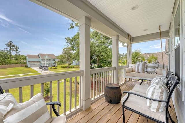 3173 Hugh Bennett Dr, Johns Island, SC 29455 - deck featuring a porch and a yard