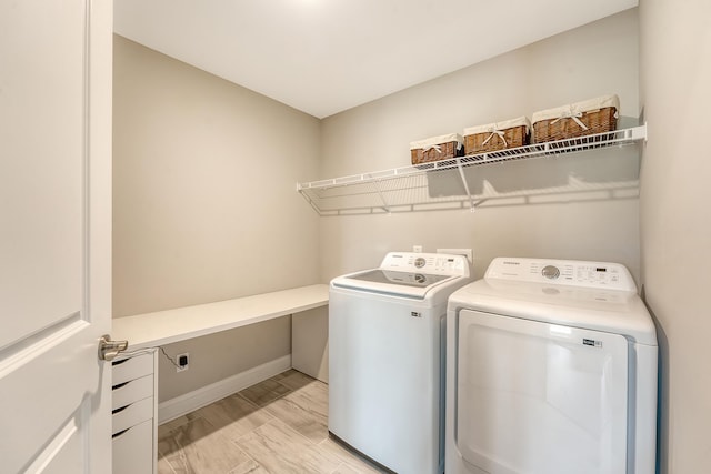 3173 Hugh Bennett Dr, Johns Island, SC 29455 - clothes washing area with washer and dryer and baseboards