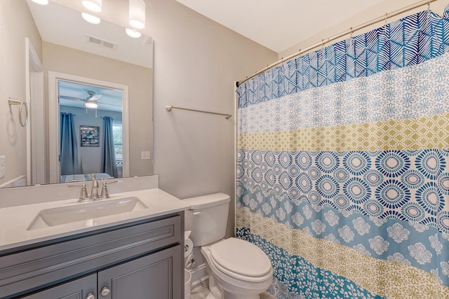 3173 Hugh Bennett Dr, Johns Island, SC 29455 - full bathroom with toilet, vanity, and a shower with shower curtain